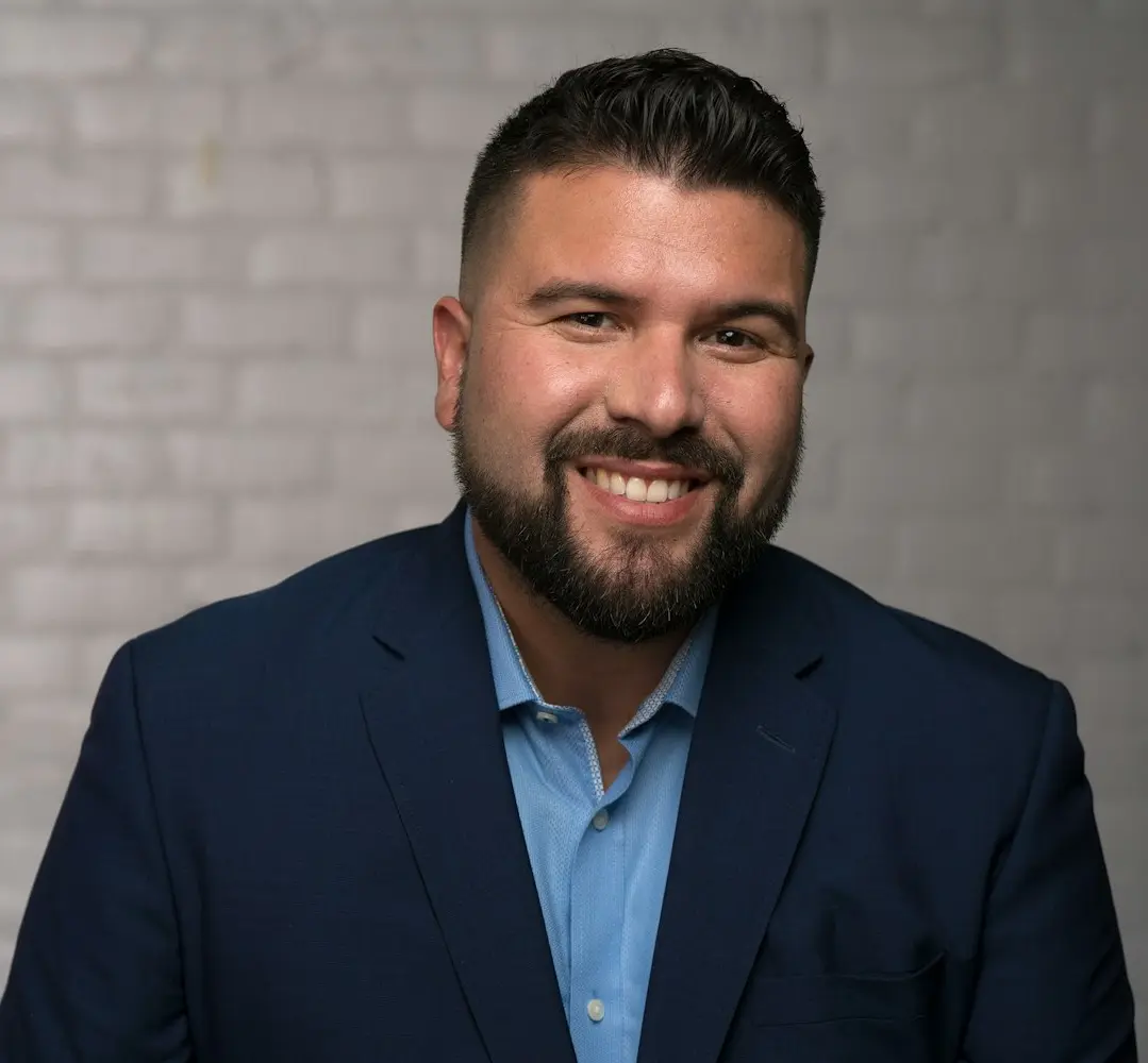 man in blue suit jacket
